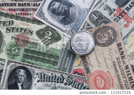 Old west period US banknotes and silver certificates with silver dollar coins Old west period US banknotes and silver certificates with silver dollar coins 111017516
