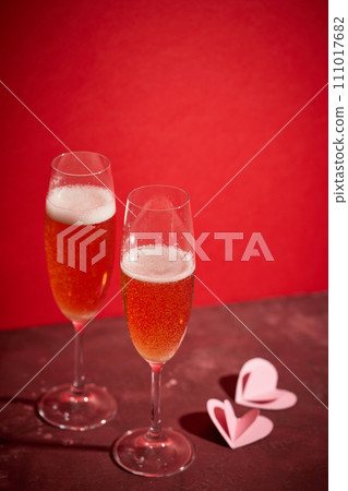 two glasses of champagne two glasses of champagne 111017682