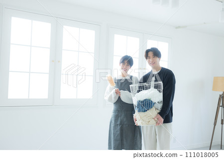 Couple doing housework Couple doing housework 111018005