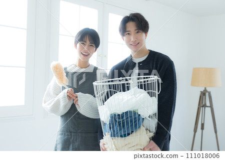 Couple doing housework Couple doing housework 111018006