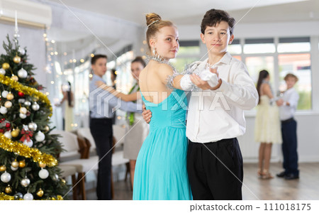 Boy and girl dancing waltz in studio Boy and girl dancing waltz in studio 111018175