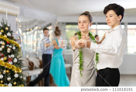 Boy and girl dancing waltz in studio Boy and girl dancing waltz in studio 111018191