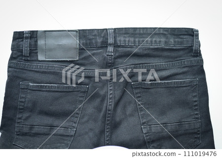 black denim clothing texture background, back of pants fashion 111019476