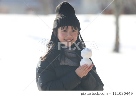 girl with snowman girl with snowman 111020449