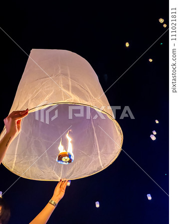 Sky lantern mass release event for Yee Peng and Loy Krathong traditional festival in Chiang Mai 111021811