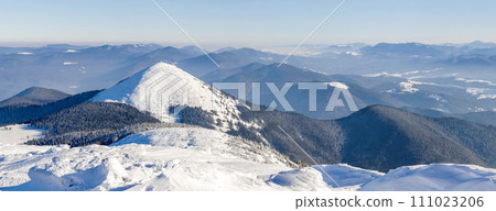 Winter mountains landscape panorana. White snow covered mountain hills Winter mountains landscape panorana. White snow covered mountain hills 111023206
