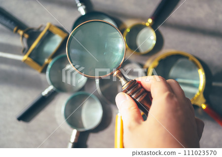 Scene with a magnifying glass Scene with a magnifying glass 111023570