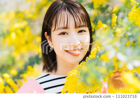 Mimosa and young woman Mimosa and young woman 111023718