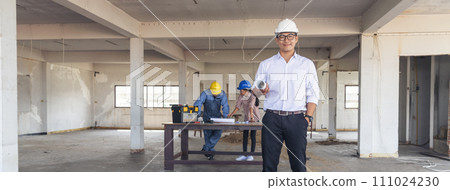 Banner Group of engineer team brainstorming at construction building with manager, contractor, worker meeting together at constrcution site. Team engineer look at Blueprint teamwork with copy space Banner Group of engineer team brainstorming at construction building with manager, contractor, worker meeting together at constrcution site. Team engineer look at Blueprint teamwork with copy space 111024230