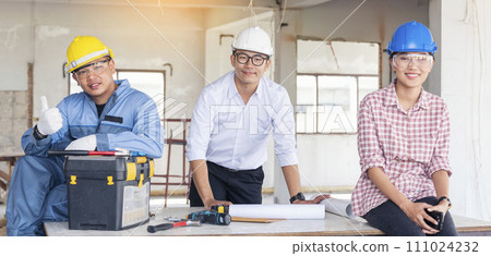 Banner Civil construction engineer team meeting on construction site with partner teamwork trust team consult together. Panorama image engineer team discuss wear hard hat construction engineer concept 111024232