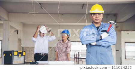 Banner Group of engineer team brainstorming at construction building with manager, contractor, worker meeting together at constrcution site. Team engineer look at Blueprint teamwork with copy space 111024235