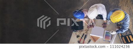 Banner Civil construction engineer team meeting on construction site with partner teamwork trust team consult together. Panorama image engineer team discuss wear hard hat construction engineer concept 111024236