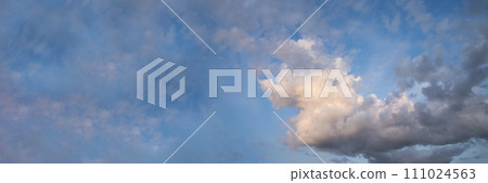 Blue sky fluffy white clouds on summer season bright clear skyline with beautiful cloudscape. Panorama blue sky clouds pattern on daylight with copy space. Cumulus cloudscape air climate sunny day 111024563