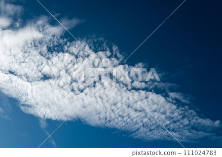 Background of clear blue sky and white cloud touching sunlight in winter season. Background of clear blue sky and white cloud touching sunlight in winter season. 111024783