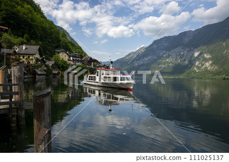 Pleasure boat on Lake Hallstattersee in Hallstatt 111025137