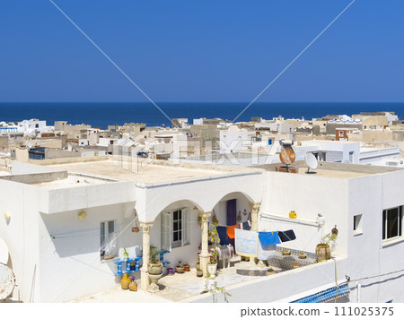 Mahdia, Tunisia White-walled houses and blue sea / Mahdia, Tunisia Mahdia, Tunisia White-walled houses and blue sea / Mahdia, Tunisia 111025375