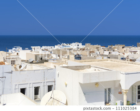 Mahdia, Tunisia White-walled houses and blue sea / Mahdia, Tunisia Mahdia, Tunisia White-walled houses and blue sea / Mahdia, Tunisia 111025384
