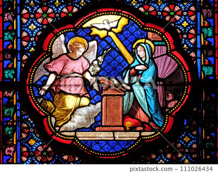 Annunciation of Mary, stained glass window in the Basilica of Saint Clotilde in Paris, France 111026434