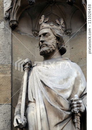 Saint Clovis, the first king of the Franks, statue on the portal of the Basilica of Saint Clotilde in Paris, France Saint Clovis, the first king of the Franks, statue on the portal of the Basilica of Saint Clotilde in Paris, France 111026438