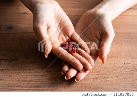 palm with pink pepper palm with pink pepper 111027036