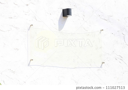 Empty copy space and white display sign on white wall background. 111027513