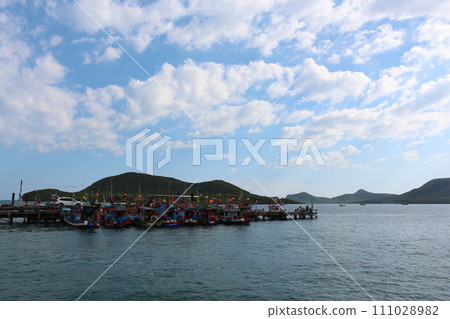 Chong Samae San Pier or Samae San Bay fishing boat bridge in the day time. Chong Samae San Pier or Samae San Bay fishing boat bridge in the day time. 111028982