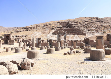 Ruins of Palace of 100 columns and tomb of Artaxerxes III, located on the slope of Rahmet Mount, Persepolis, Iran 111030119