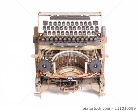 Broken metal typewriter, vintage object Broken metal typewriter, vintage object 111030599