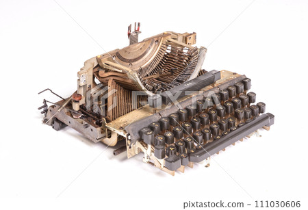 Broken metal typewriter, vintage object 111030606
