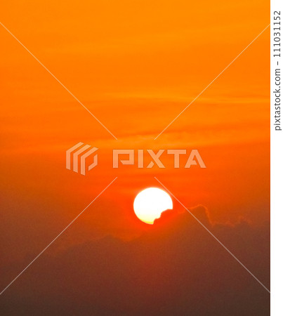 view of tourists enjoying the sunset on Kuta beach 111031152