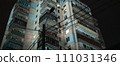 Multistory soviet building at the night with a light in windows  111031346