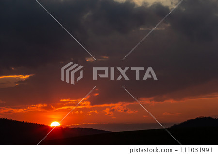 Horizon panorama and dramatic twilight sky and cloud sunset background. Natural sky background texture, beautiful color. Dark clouds, big storm and rain. Weather and nature concept 111031991