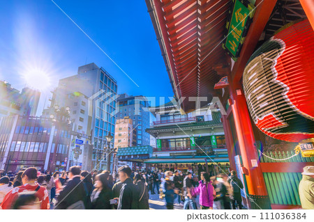 Japan's Tokyo cityscape January - Sensoji Temple is crowded with tourists like before the coronavirus pandemic...A ray of hope...No need for a mask... = 27th 111036384