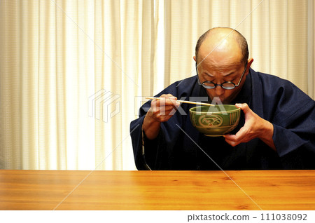 Middle-aged man relaxing at home Middle-aged man relaxing at home 111038092