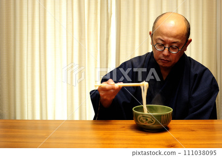 Middle-aged man relaxing at home Middle-aged man relaxing at home 111038095