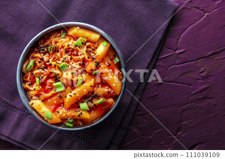 Rabokki, tteokbokki or topokki with ramen, Korean street food, spicy rice cakes 111039109