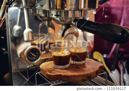 Coffee in a small cup from the maker 111039127