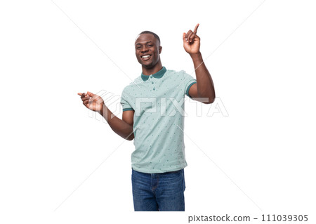 young charismatic american guy dressed in a mint t-shirt on a white background 111039305