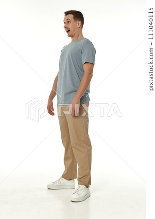surprised guy looking at camera on white studio background surprised guy looking at camera on white studio background 111040115
