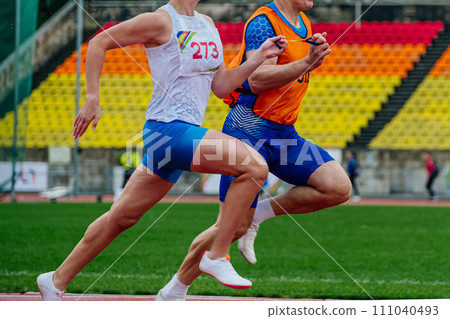 blind male athlete runner with guide running race, summer para athletics championships 111040493