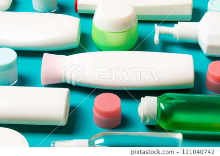Group of plastic bodycare bottle Flat lay composition with cosmetic products on colored background empty space for you design. Set of White Cosmetic containers, top view with copy space 111040742