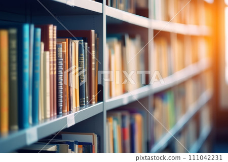Library shelves with many books. Education, knowledge and learning concept. Background with selective focus Library shelves with many books. Education, knowledge and learning concept. Background with selective focus 111042231