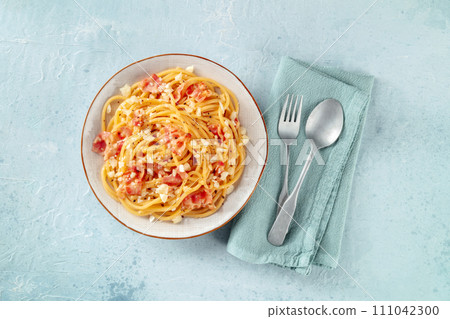 Carbonara pasta dish, traditional spaghetti with pancetta and cheese 111042300