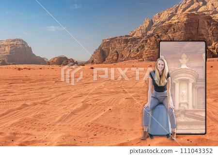 Travel to Jordan concept with smiling girl sitting on the suitcase. 111043352