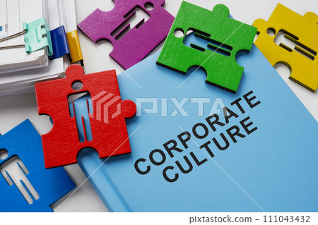 A book about corporate culture and puzzle pieces. A book about corporate culture and puzzle pieces. 111043432