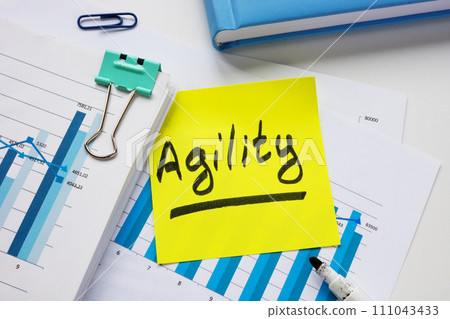 Stack of documents and sticker with inscription agility. 111043433