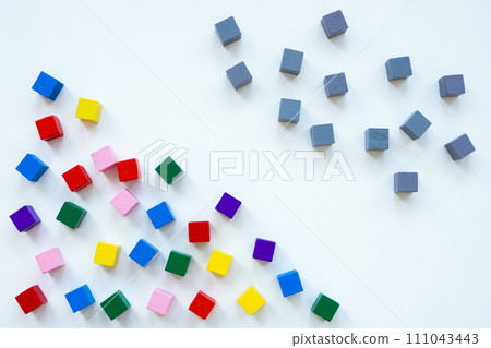 Gray cubes and multi-colored ones as a symbol of diversity. 111043443