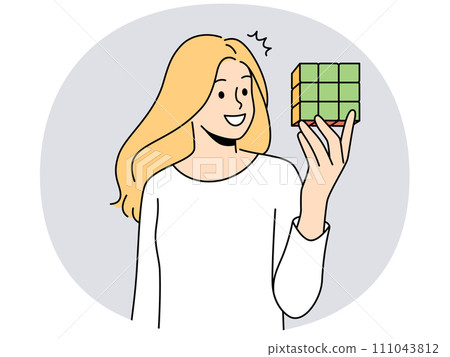 Smiling woman hold rubik cube Smiling woman hold rubik cube 111043812