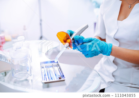 A set of sterile dental instruments for dental treatment. Dental care for people. 111043855