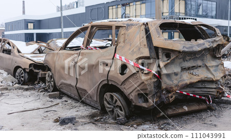 Kyiv, Ukraine - January 3, 2024: Burned civilians cars after a Russian's missiles attack 111043991